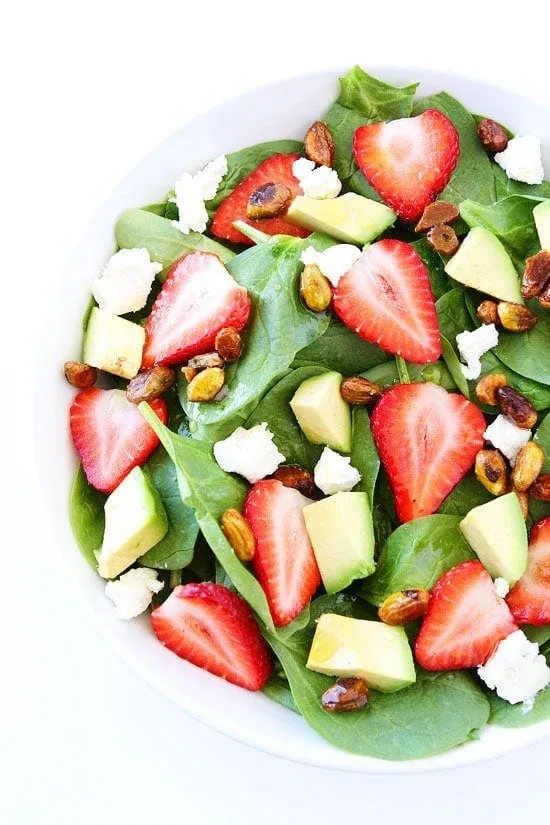 Strawberry Spinach Salad with Avocado, Goat Cheese, and Candied Pistachios
